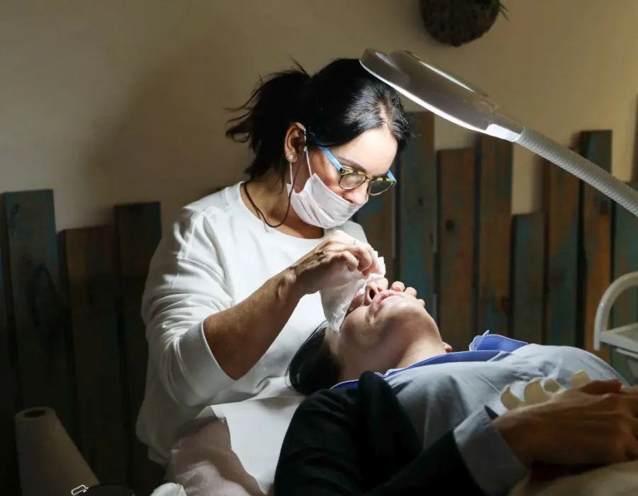 Registered nurse injector performing a precise aesthetic treatment
